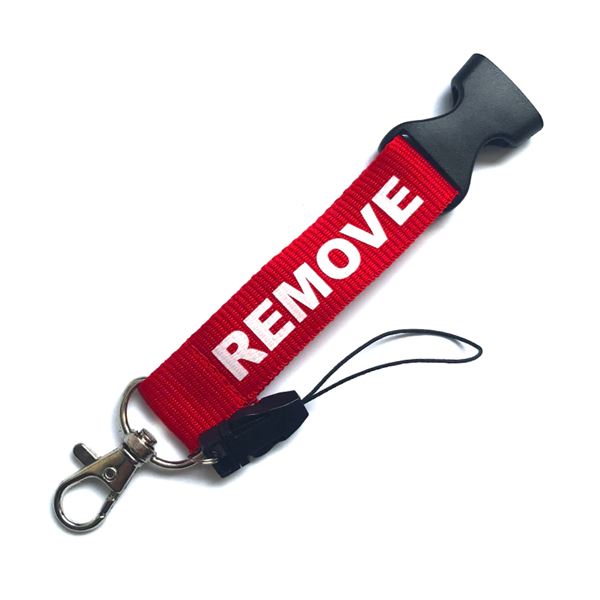 Šňůrka na krk REMOVE BEFORE FLIGHT tm. červená