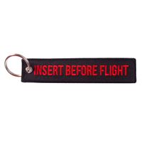 Key Ring “INSERT BEFORE FLIGHT” black / red