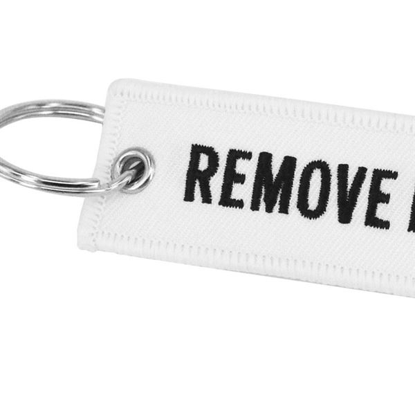 Keyring REMOVE BEFORE FLIGHT white