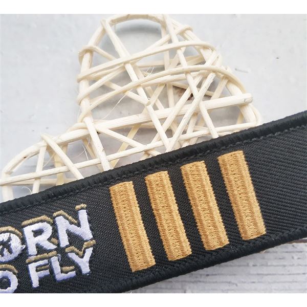 Keyring BORN TO FLY 4 BAR black