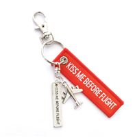 Keyring KISS ME BEFORE FLIGHT small red Keyring KISS ME BEFORE FLIGHT small red