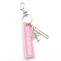 Keyring KISS ME BEFORE FLIGHT small pink Keyring KISS ME BEFORE FLIGHT small pink
