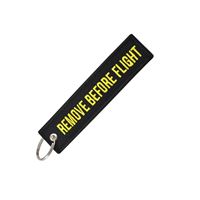 Keyring REMOVE BEFORE FLIGHT black/yellow