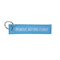 Keyring REMOVE BEFORE FLIGHT light blue