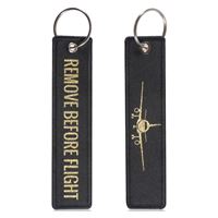 Keyring REMOVE BEFORE FLIGHT gold/plane