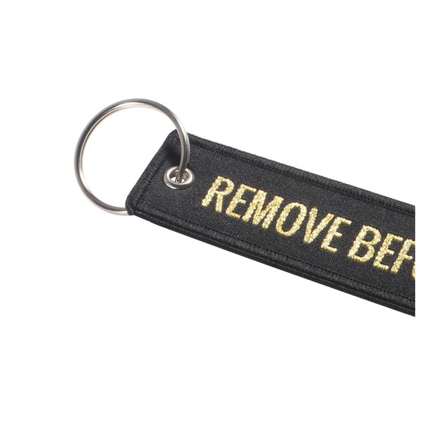 Keyring REMOVE BEFORE FLIGHT gold/plane