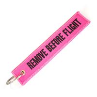 Key Ring “REMOVE BEFORE FLIGHT” pink