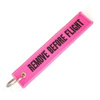 Keyring REMOVE BEFORE FLIGHT pink