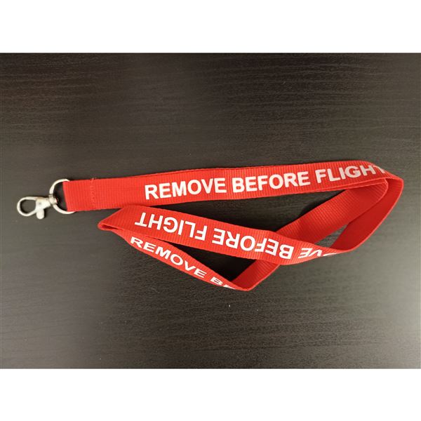 Šnůrka na krk Remove Before Flight červená